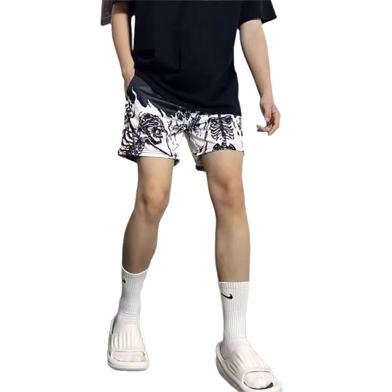 Explosiones transfronterizas al por mayor pantalones cortos de malla de hielo pareja suelta de chicos con pantalones de baloncesto de 3 puntos de verano