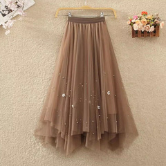 重工釘珠網紗スカートの大きいサイズの婦人服の中の長いタイプの不規則なスカートはアンドロメダの紗のスカートのA字の半身のスカートを並べます。