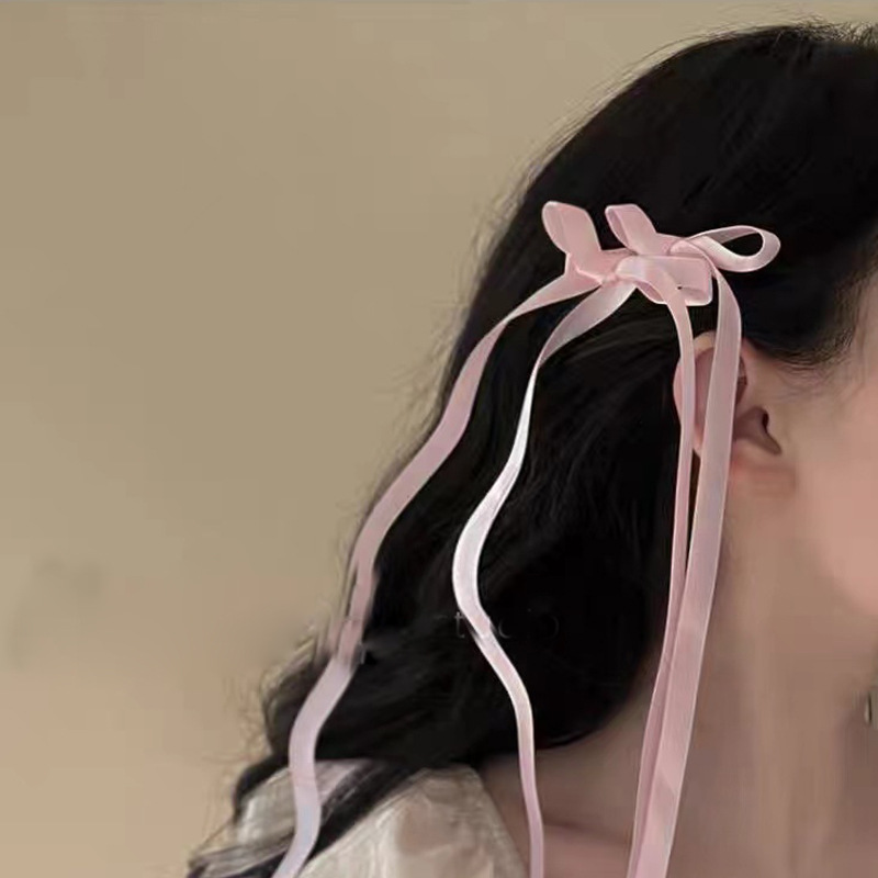Розовая заколка для волос с бантиком