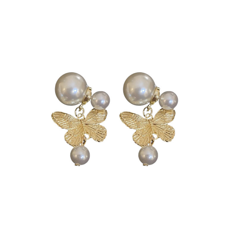 Pendientes de perlas artificiales de mariposa de aguja de plata Pendientes de todo fósforo de nicho retro femenino Pendientes de temperamento de moda Lujo ligero de alta gama