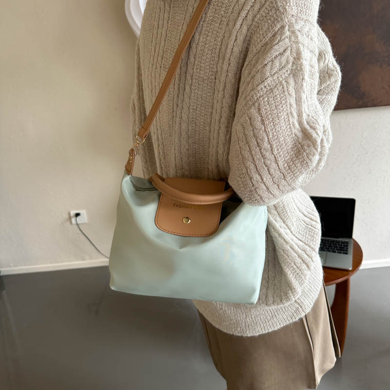 This year's popular Oxford small women's 2023 new trendy contrasting color crossbody dumplings bag casual_voghion.com