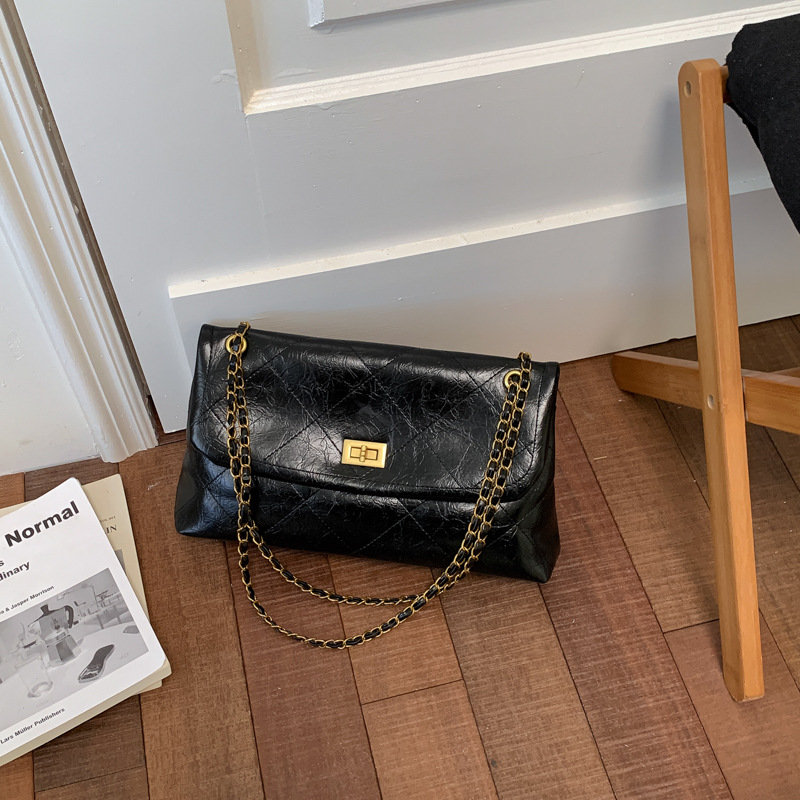 Bolso retro de gran capacidad para mujeres 2026 nueva moda cadena de diamante mochila de hombro de nicho de viaje bolsa de mano