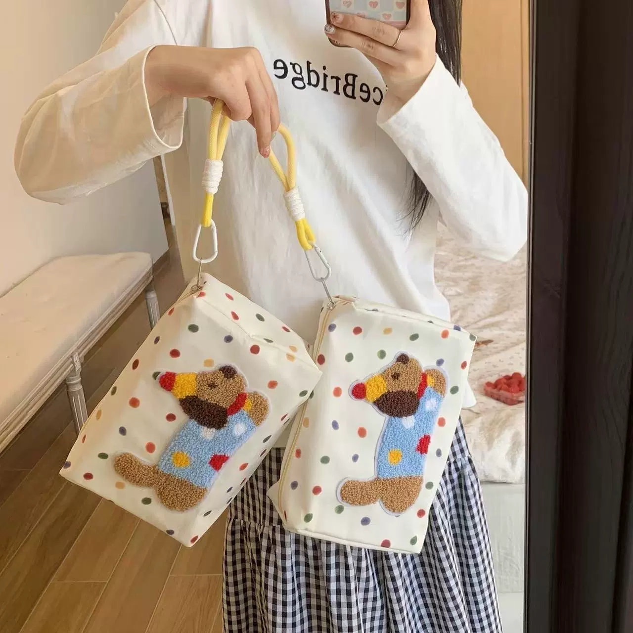 Capacious cosmetic bag, storage system, handheld shoulder bag, organizer bag for traveling