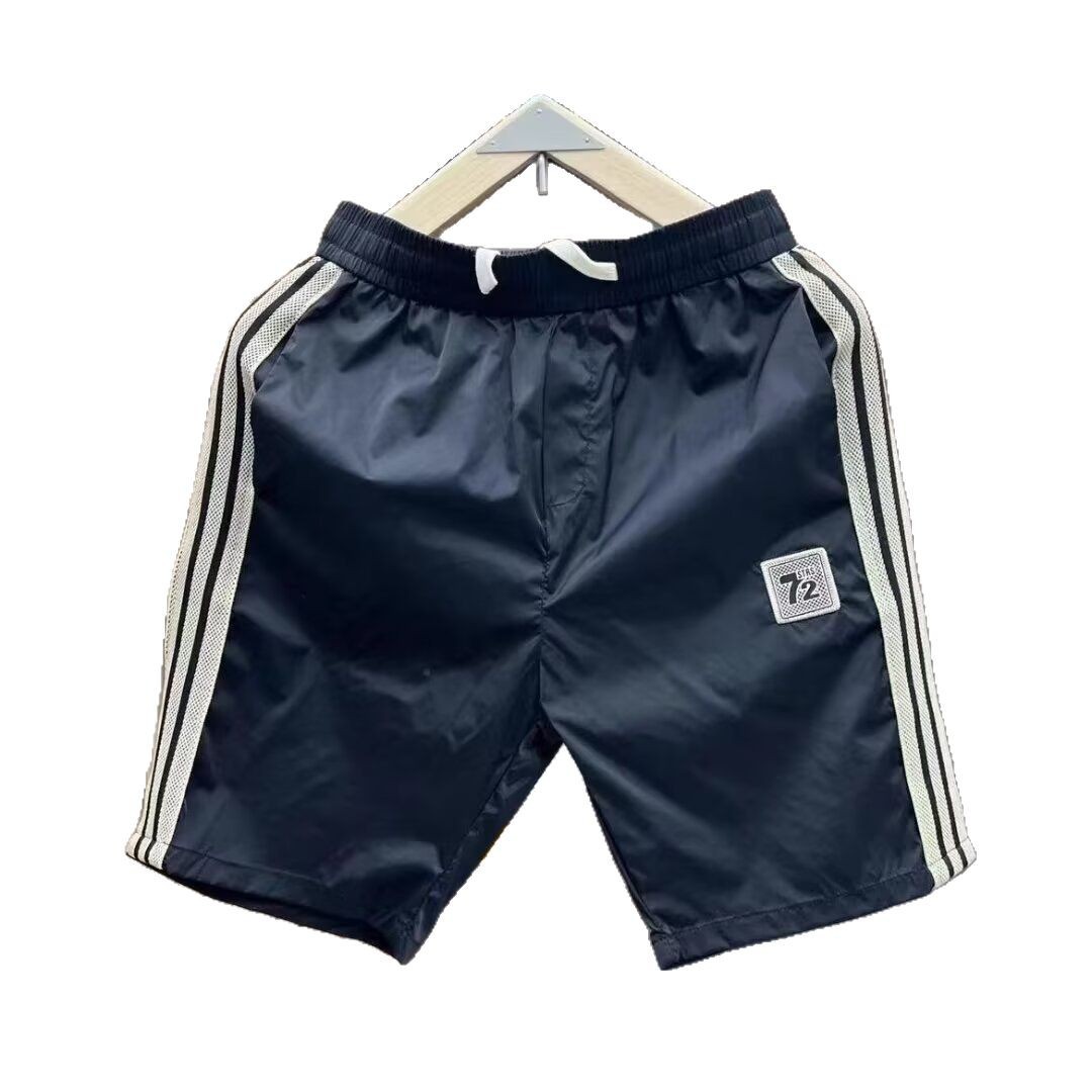 Pantalones cortos de cinco puntos para hombres de verano delgados de moda de alta calidad simple versátil suelta pantalones de playa