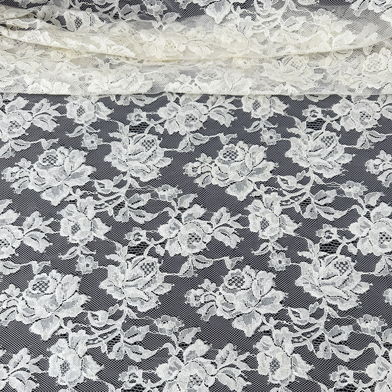 Tela de encaje Primavera/Verano 2026, encaje calado con diseño de rosas, tela con borde de pestañas, varios colores disponibles, stock de fábrica.