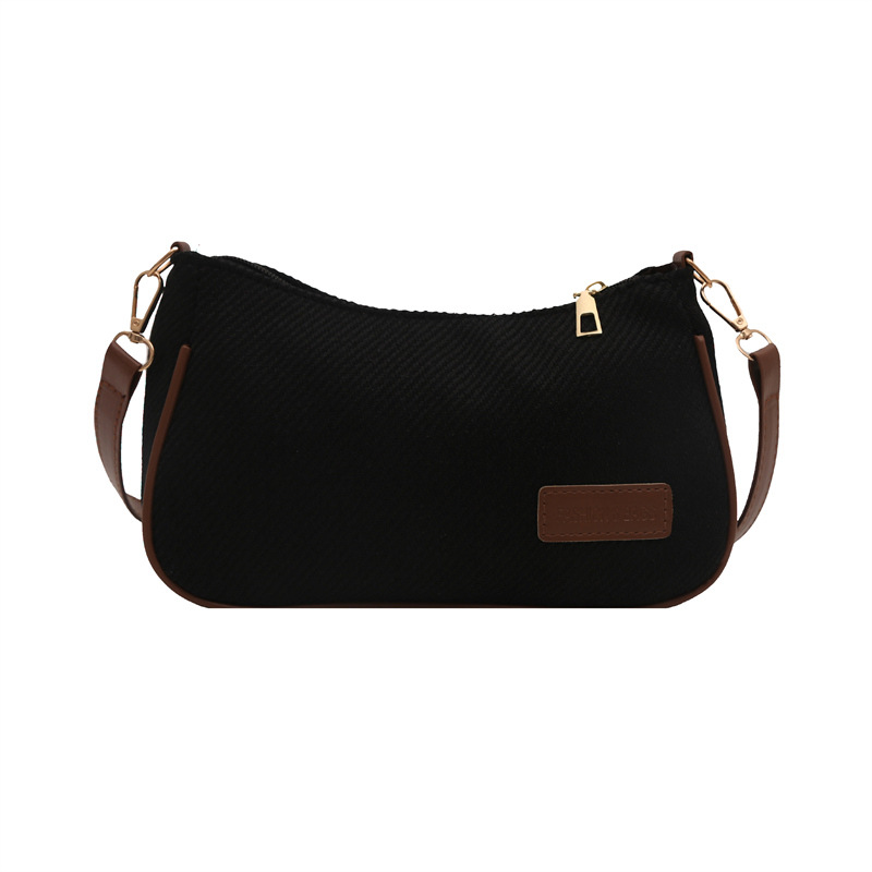 Elegante y simple temperamento nicho bolso de hombro casual 2025 primavera nuevo bolso de mochila de mujer versión coreana bolso popular