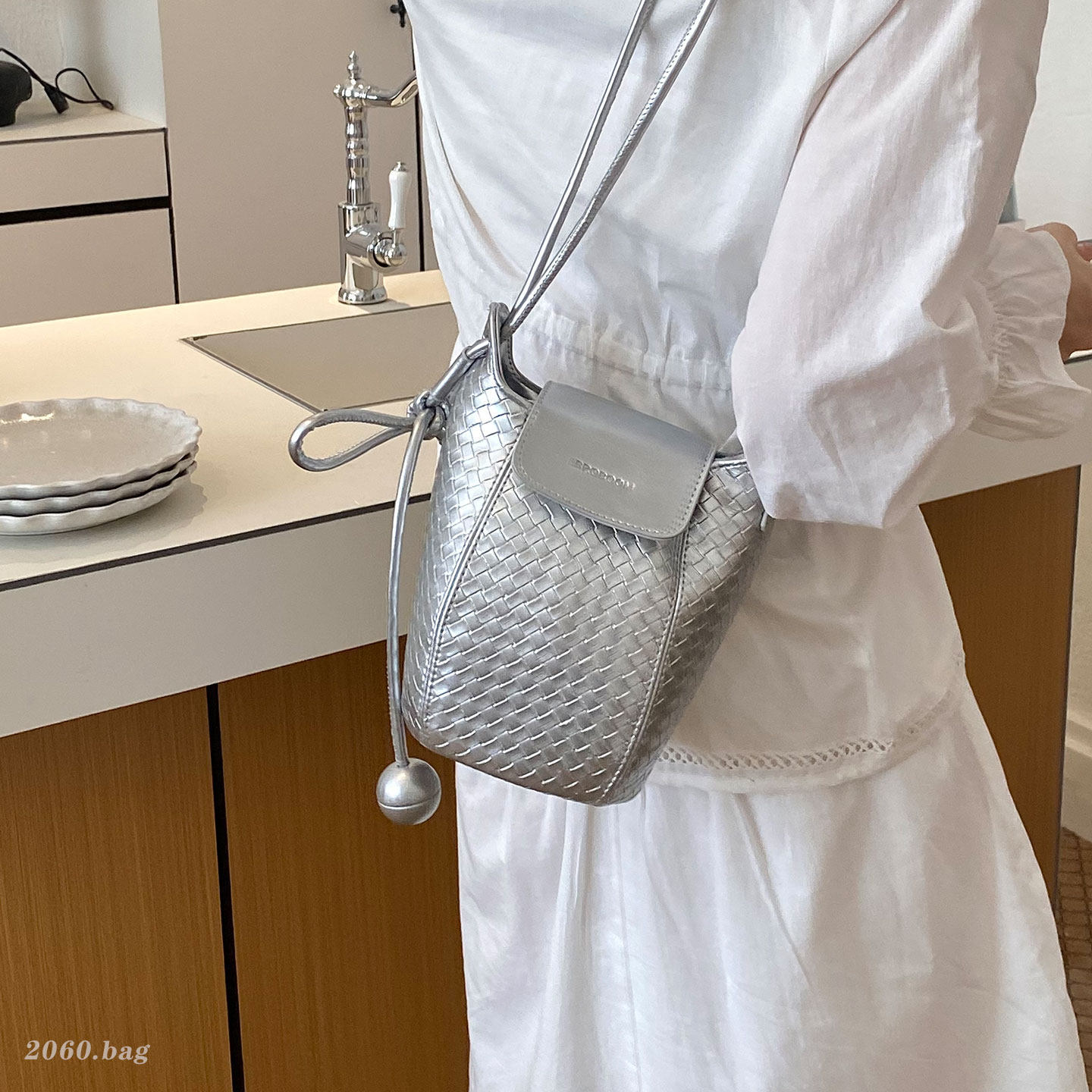 Nuevo hombro único sensación de cubo de agua de teléfono móvil tejido exquisita bolso de mujer mochila casual verano 2026