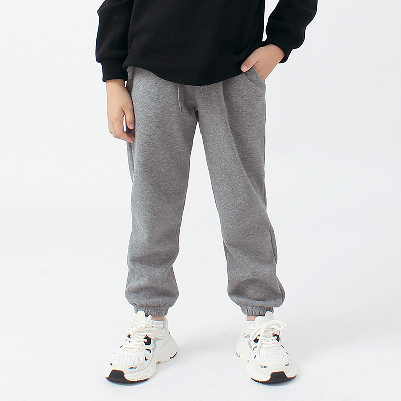 Pantalones de primavera para niños, estilo coreano, nuevos pantalones deportivos largos para niños, pantalones casuales de color sólido para niños grandes, pantalones antimosquitos, pantalones para niños al por mayor