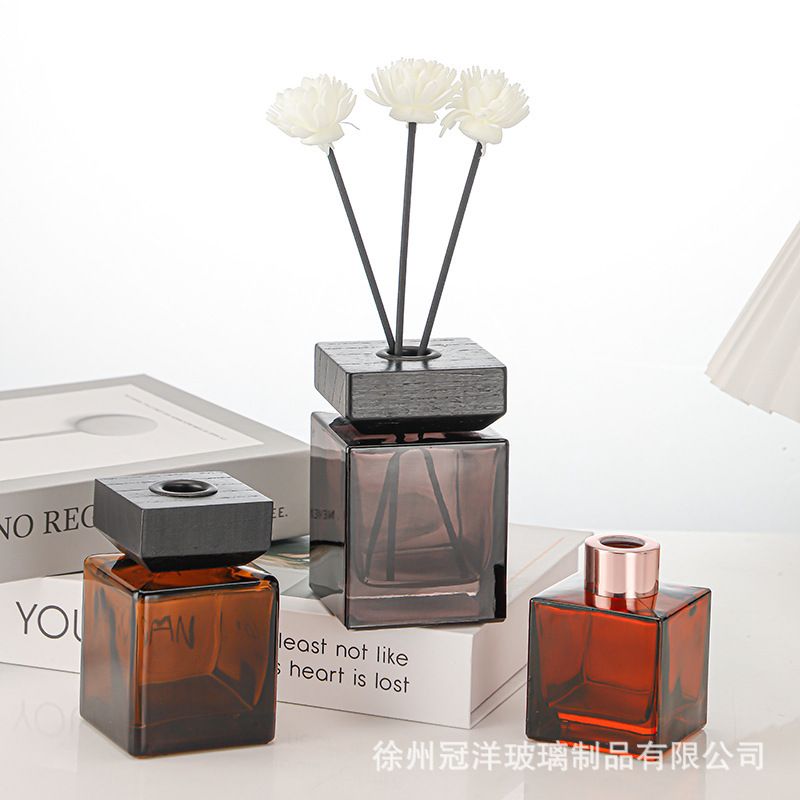 Botella de fragancia cuadrada de color 50ml 100ml botella de fragancia hotel adorno botella de fragancia de alta calidad de caña flor seca botella
