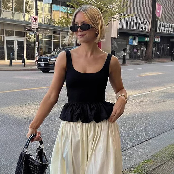 Top corto sexy sin mangas con corte ajustado y espalda descubierta, de color liso, estilo europeo y americano, para mujer, nueva colección primavera-verano 2026.