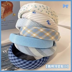高級感の軽い贅沢な髪のカチューシャの女性の洋風のファッションの広い辺の高い頭のトップのカチューシャ2025年の新型の髪の束の髪の飾り