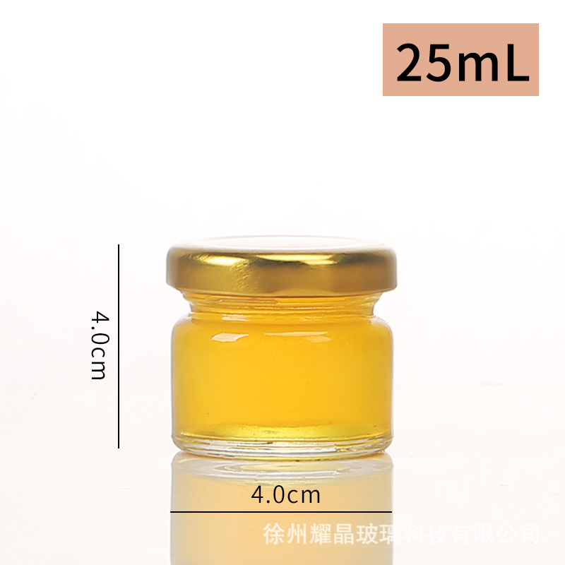 Botella de vidrio redonda de grado alimenticio, botella enlatada transparente sellada, botella de salsa de chile vacía, botella de miel con tapa para cocinar