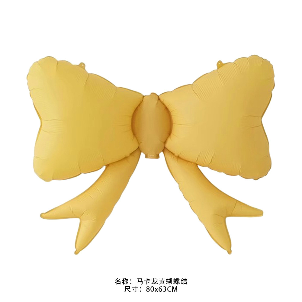 马卡龙黄蝴蝶结