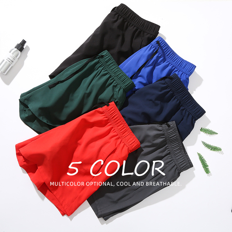 Pantalones cortos deportivos para correr anti-exposición de los hombres falsos de dos piezas de entrenamiento suelto al aire libre pantalones de fitness delgados pantalones cortos de secado rápido