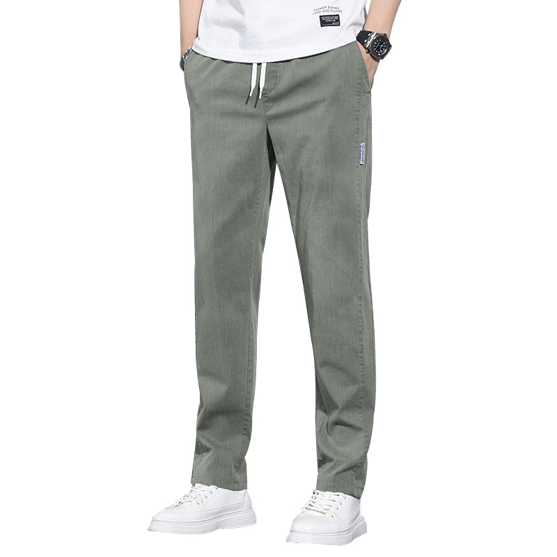 Four Seasons pantalones casuales transpirables micro elásticos para hombres jóvenes estilo coreano versátil pantalones largos rectos sueltos para hombres