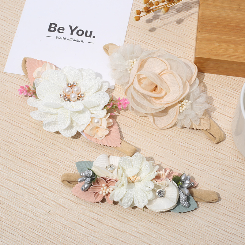 Fábrica al por mayor nuevo estilo pastoral de nylon Flor del pelo del bebé banda fresca foto accesorios para el cabello