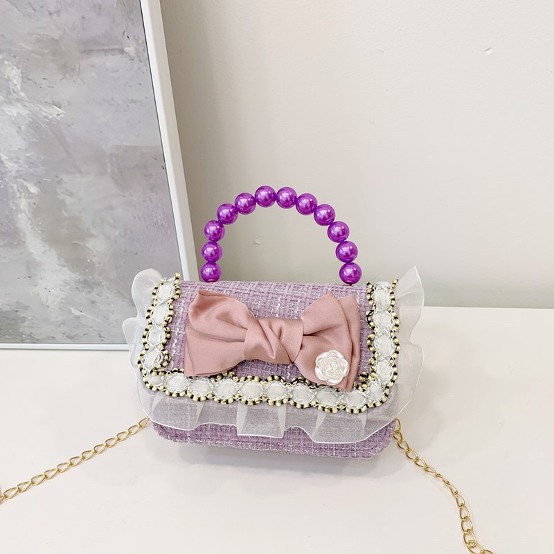 Niña tween pequeña bolsa de hombro arco encantadora princesa mochila de perlas de aire extranjero para niños bolsos lotes