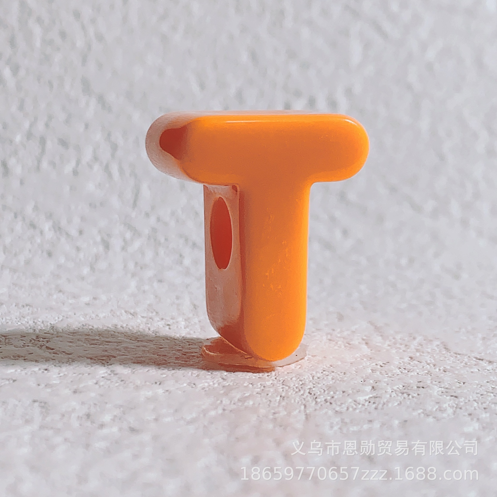 T (Orange)