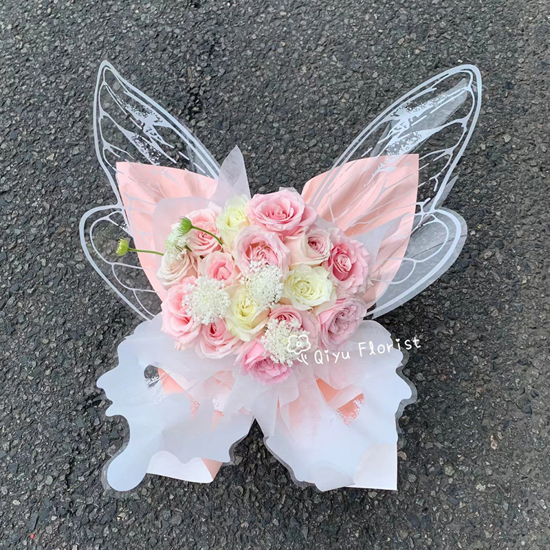 Nuevo día de San Valentín mariposa de cristal en forma de papel de embalaje impermeable material transparente red de alas de sangrana papel de envoltura de flores