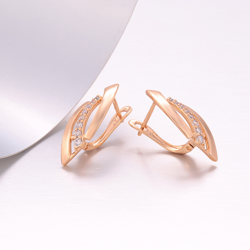 Aretes tipo hebilla de hoja 18K de aleación de cobre para mujer