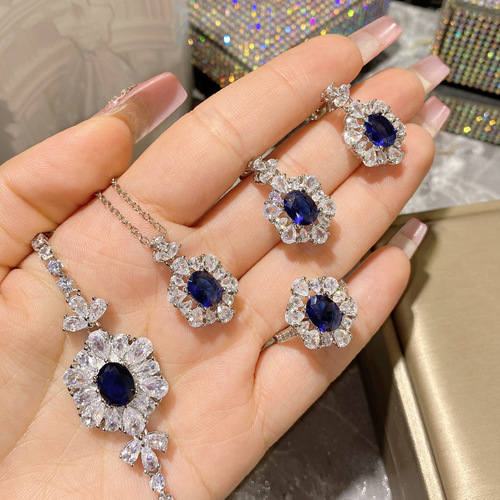 Versa jewelry fashion set gold-plated imitation tanzanite sapphire pendant 10*12 earrings live ring set of four