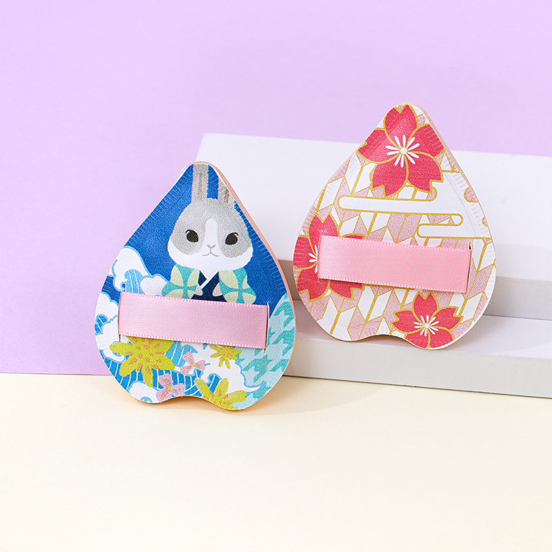 La fábrica personaliza la borla de algodón de azúcar de gran tamaño sin comer polvo, engrosamiento, amor, maquillaje en forma de corazón, esponja, cojín de aire, maquillaje, servicio gigante