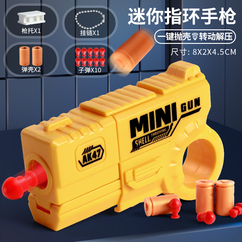 Mini dedo para niños, anillo de descompresión, pistola giratoria, puede lanzar proyectiles, juguetes geniales, juguetes novedosos para niños al por mayor