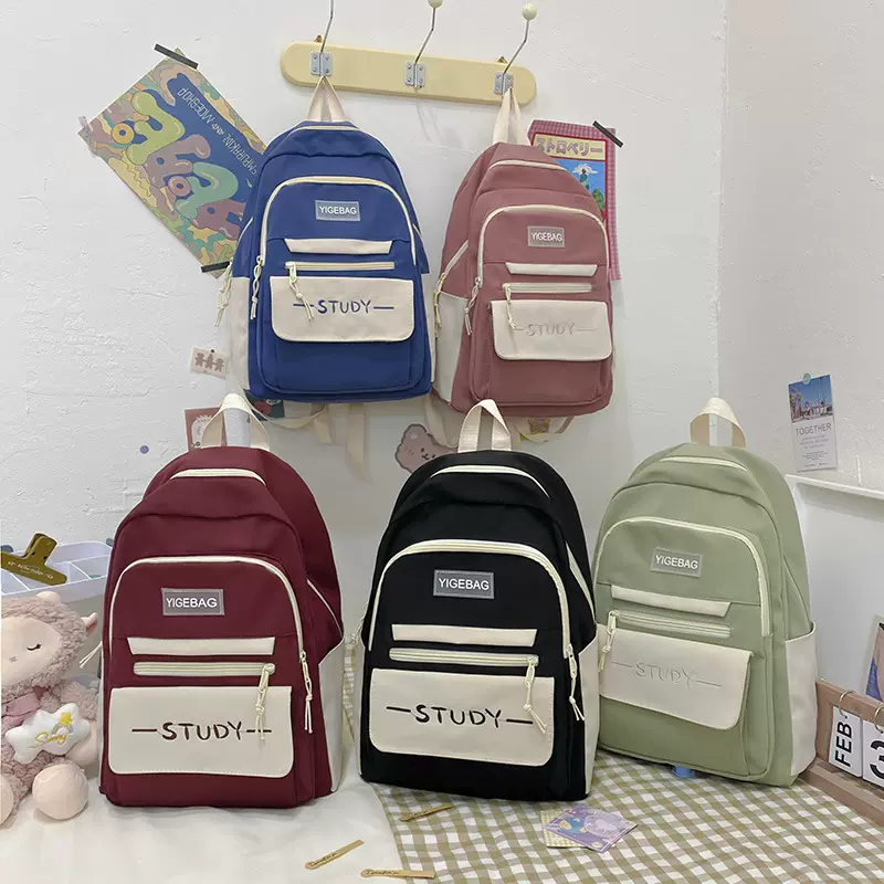 2023新款尼龙背包洋气印花字母学生补习双肩包大容量小学初中书包
