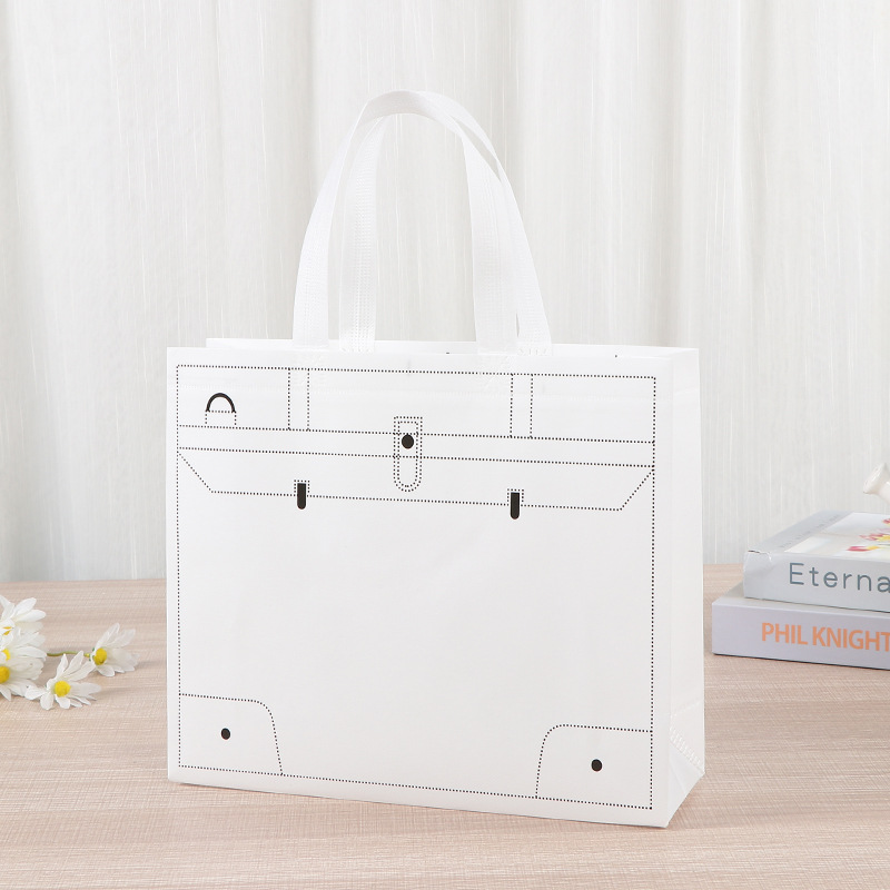 Bolsa de tela no tejida portátil gruesa bolsa de embalaje tridimensional resistente al desgaste de gran capacidad de equipaje de dormitorio de estudiantes bolsa de mano