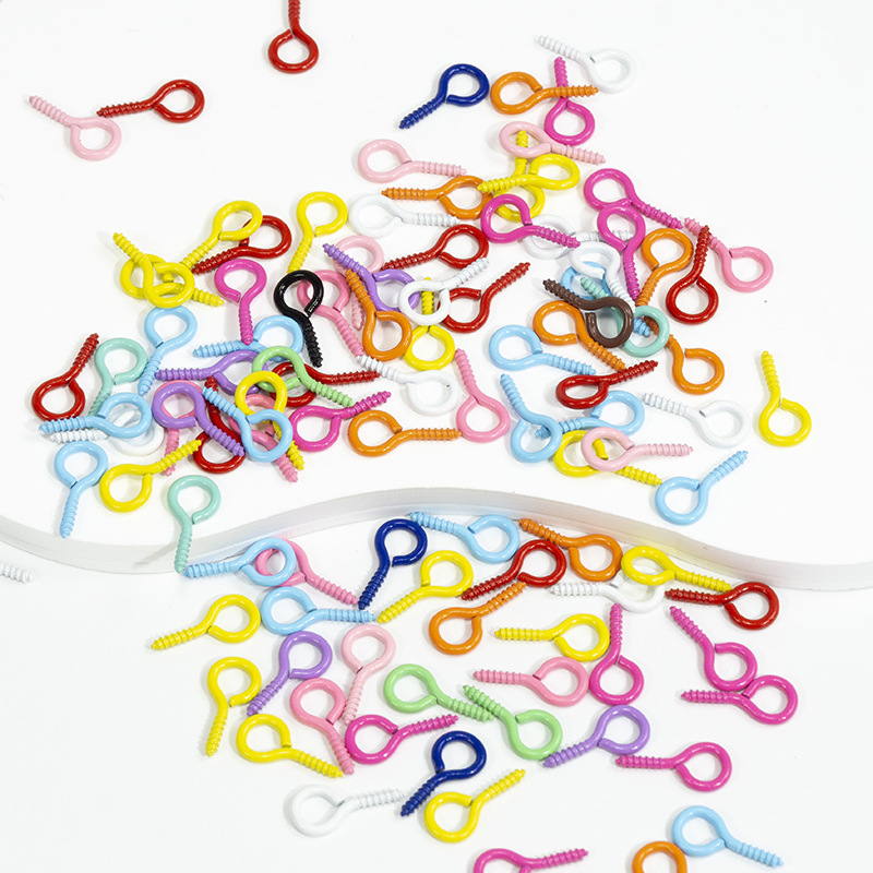 Accesorios de la joyería DIY 100 color spray pintura ovejas cuerno clavo tornillo ojo mirando teléfono caso colgante llavero