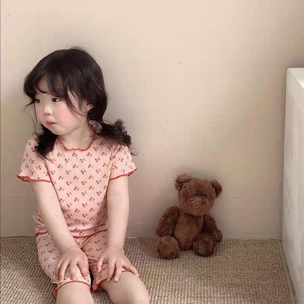 Verano nueva ropa de seda de hielo ropa para niños ropa de hogar para niños y niñas traje de moda de dos piezas conjunto de ropa de aire acondicionado para niños medianos y pequeños