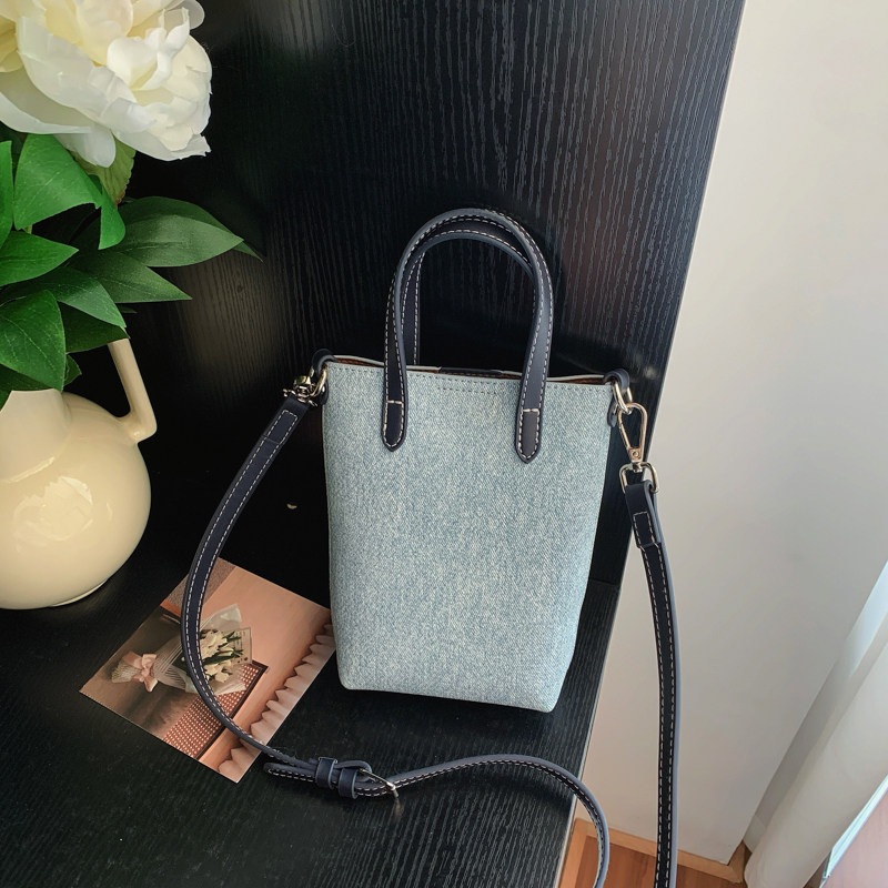 Casual nuevo bolso de verano de mujer inclinado 2026 cubo de hombro portátil versátil bolso pequeño teléfono móvil