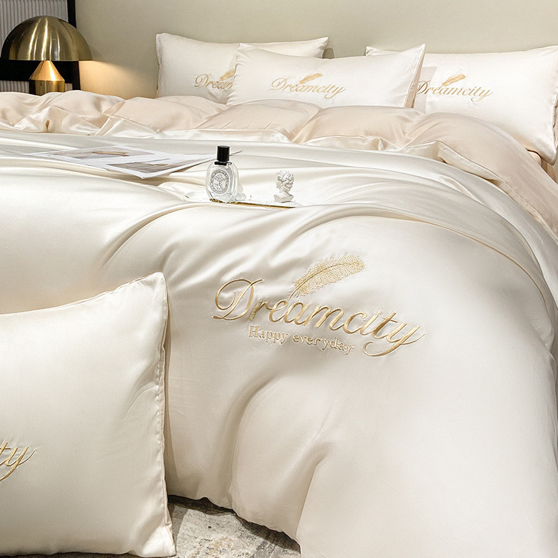 Juego de cuatro piezas de seda de hielo de alta calidad, cama de seda de lujo ligera, funda de edredón para dormir desnuda, sábana de tres piezas de primavera y verano