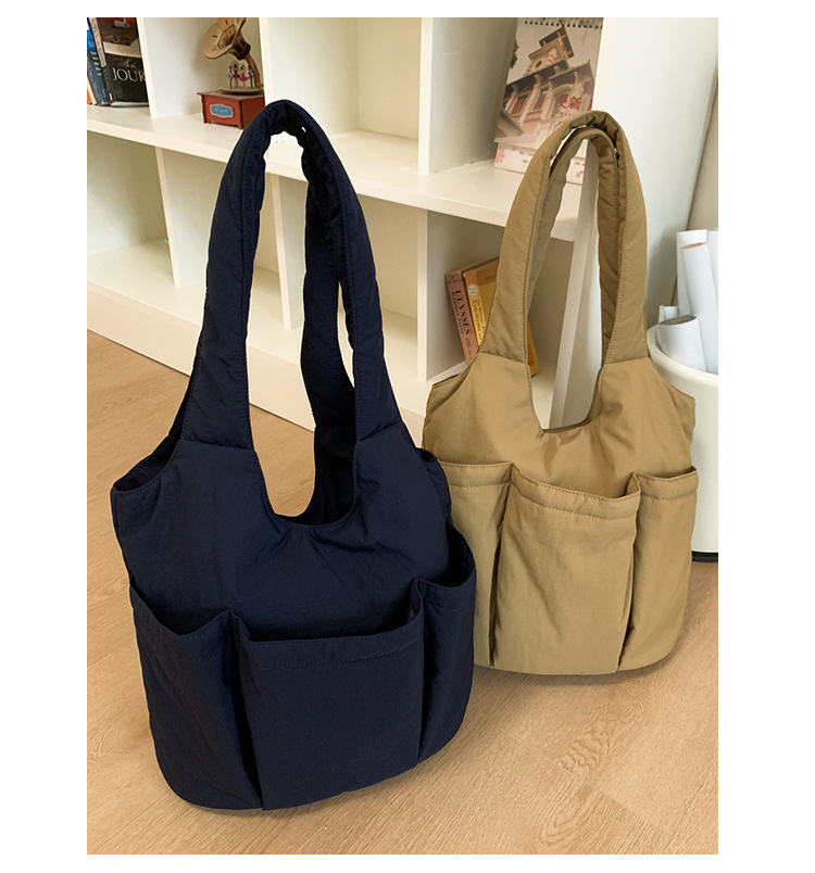 Single-shoulder underarm bag, large-capacity tote bag, versatile nylon fabric bag for women, new pleated multi-pocket commuter handbag undefined