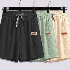 氷糸半ズボンの女性の夏の薄いタイプはやせていてゆったりしています。