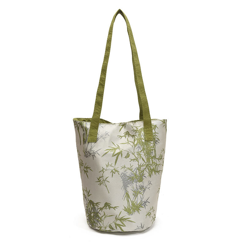 Nuevo bolso de cubo chino 2025 nuevo bolso femenino de seda bolso de bambú de estilo nacional bolso de hombro de caqui de alta calidad marea