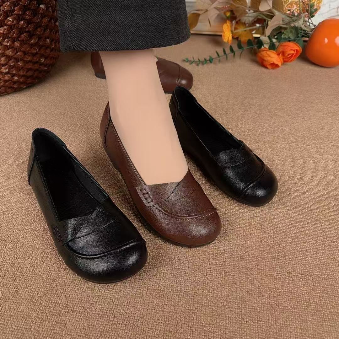 2026 primavera y verano nuevo estilo de moda versátil boca superficial cabeza redonda perezosa un pedazo de zapatos de madres de moda para mujeres