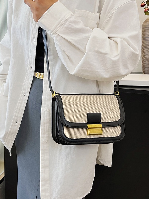 Alta sensación retro bolso pequeño para mujeres 2025 nueva moda transfronteriza color contrastante empalme viaje mochila de hombro