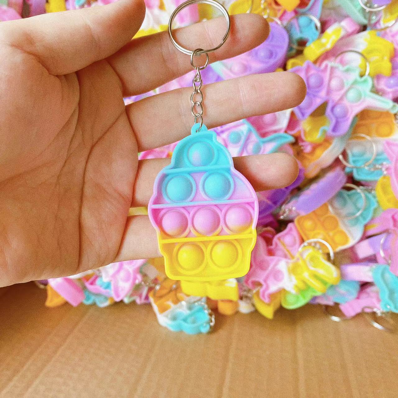 Dedo de presión burbuja Le descomprimir juguetes para niños pequeño arco iris llavero colgante regalo regalo de jardín de infantes