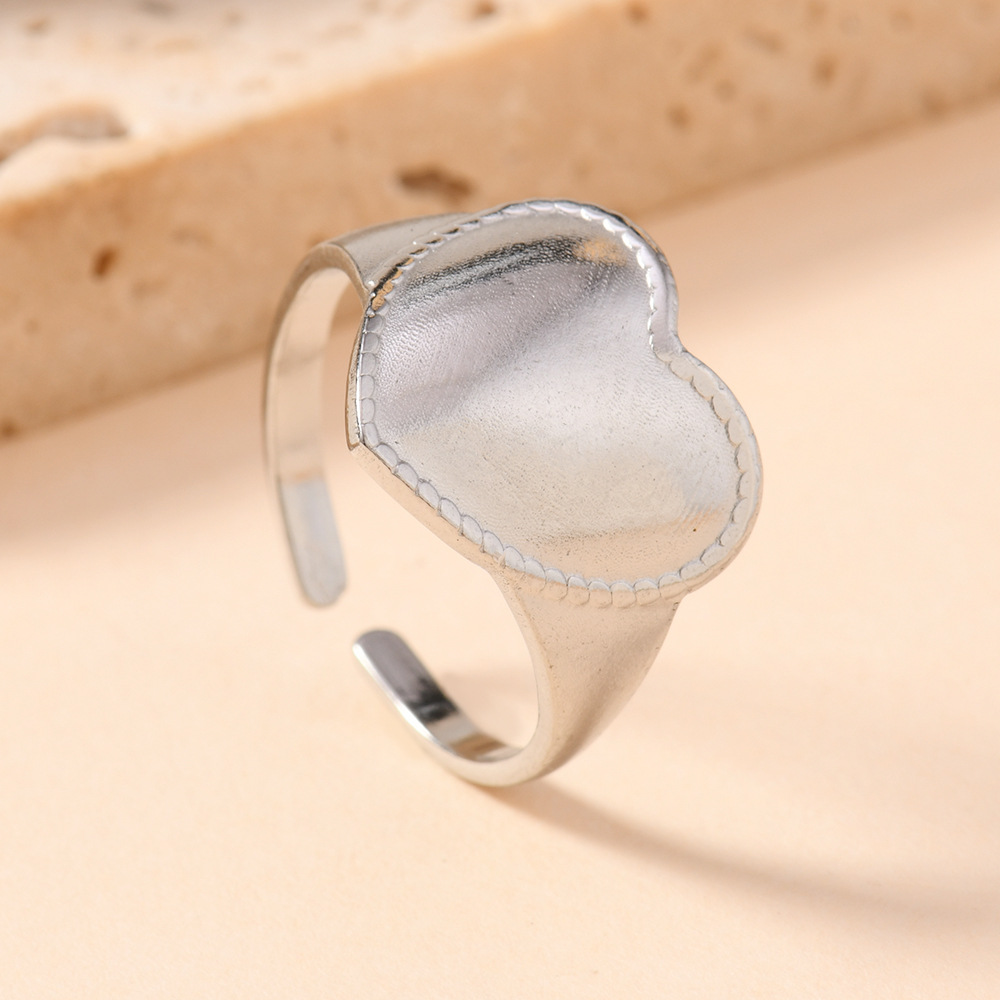 Europa y América simple anillo de acero inoxidable abierto ajustable presión de aceite amor anillo de acero de titanio joyas de moda pareja