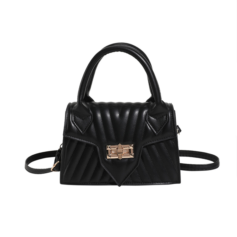 Textura 2025 nueva moda de impresión de estilo extranjero rotary-lock mochila de hombro casual color caramelo bolso de mano de mujer