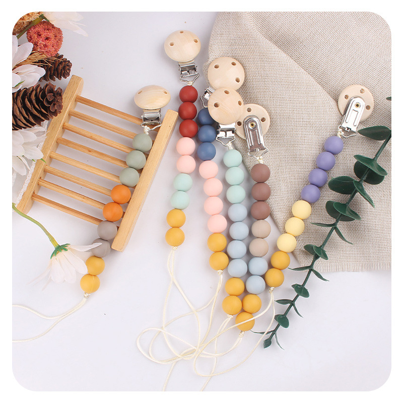 Productos para bebés y niños pequeños grano chupeta clips para calmar bebés mordiendo silicona mordiendo pegamento molar chupeta cadena anti-caída cadena nueva