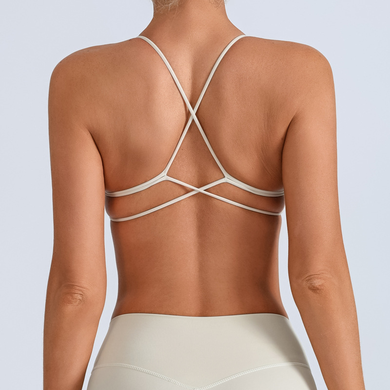 Traje de yoga europeo y americano transfronterizo, espalda hermosa con almohadilla para el pecho, sujetador con tirantes cruzados, pantalones deportivos de secado rápido de melocotón de cintura alta