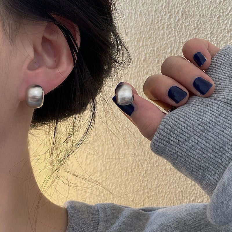 Matte crooked elegant earrings