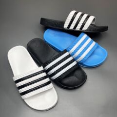 クロスボーダーの大きいサイズのスリッパと家庭の室外の男女の経典のカップルのカジュアルな滑り止めの厚い底の1字のスリッパは代行します。