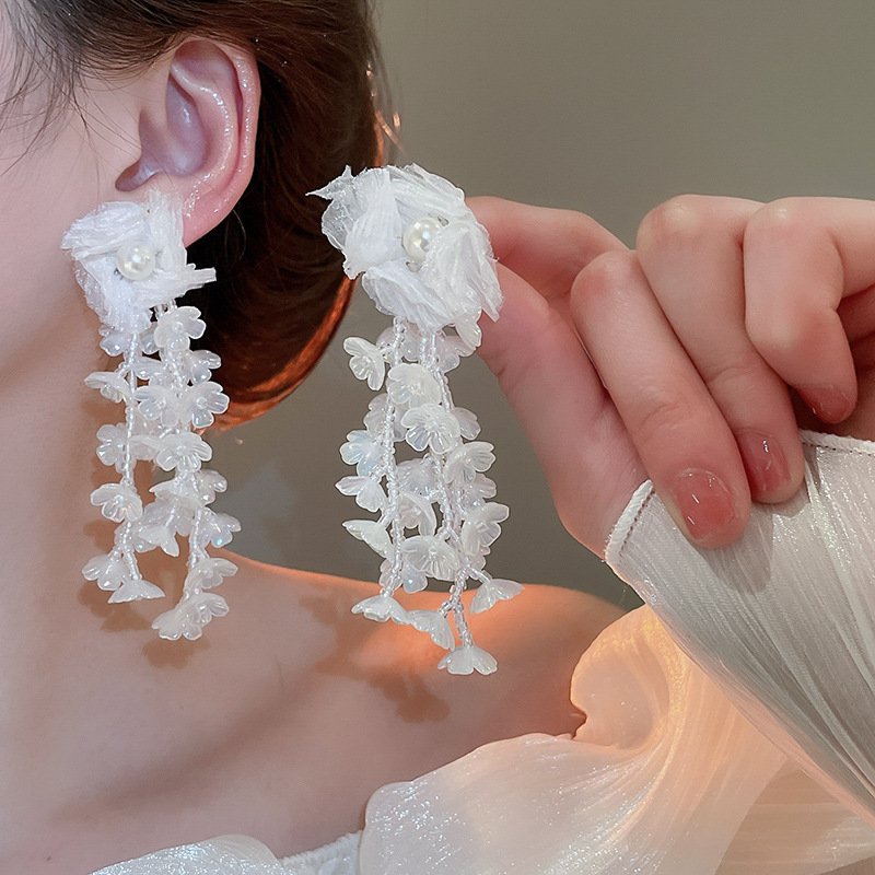 Pendientes de malla de pétalo de dopamina Pendientes de estilo de vacaciones junto al mar de estilo nuevo estilo caliente Pendientes de temperamento exagerado de todo fósforo al por mayor