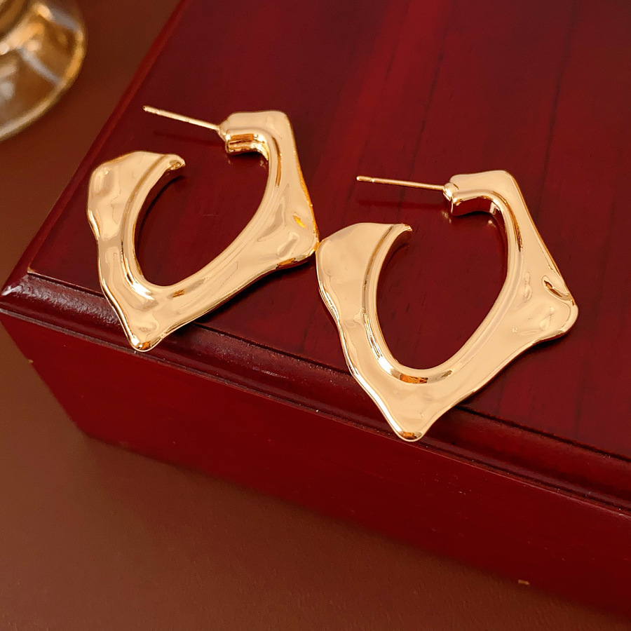 Aguja de plata MEDIADOS DE-antigua flor redonda borla pendientes de metal retro europeo y americano elegante luz pendientes de lujo al por mayor para las mujeres