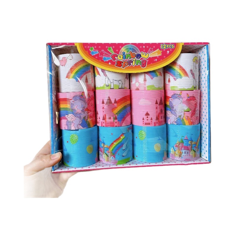 Anillo elástico para niños juguetes de rompecabezas al por mayor animaciones de dibujos animados arcoíris anillo de barra de bobina 12 una caja de arcoíris anillo