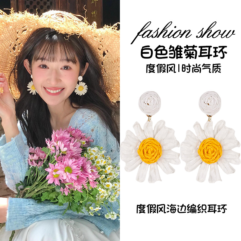 White earrings, flowered