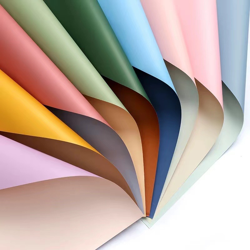 Li Zhiran Papel Ouya impermeable bicolor 56*56 Apertura de la canasta de flores Material Ramo Papel de embalaje al por mayor Spot